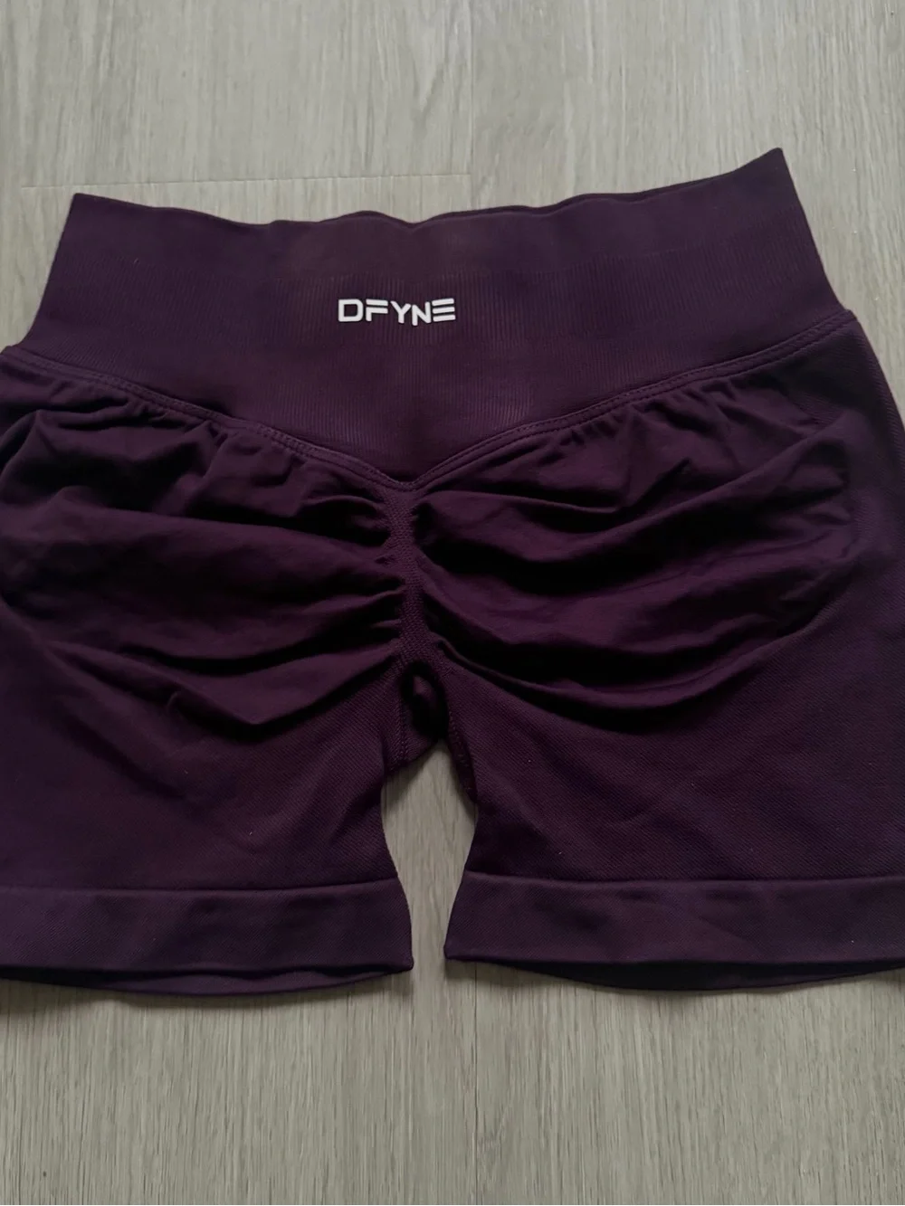 DFyne purple impact sports bra and shorts set